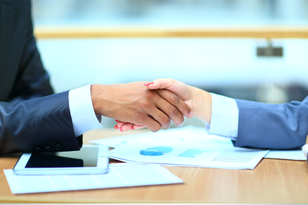 two people shaking hands