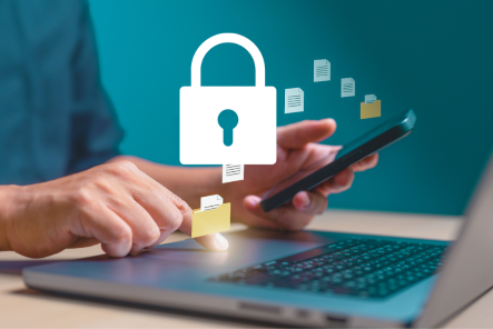 Person working on a computer with padlock image
