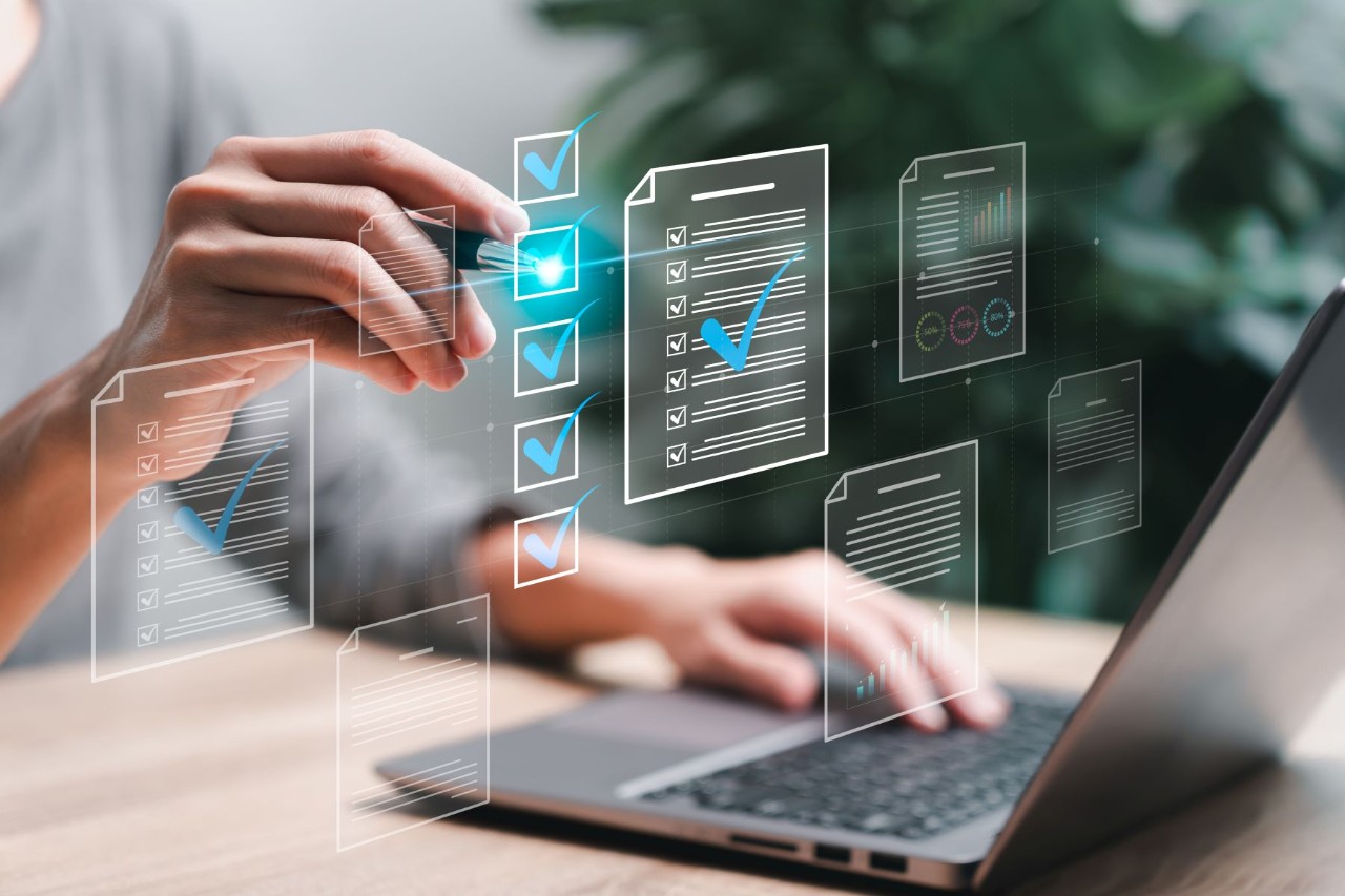 Person looking at documentation on a computer