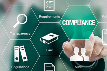 dedo sobre la palabra compliance